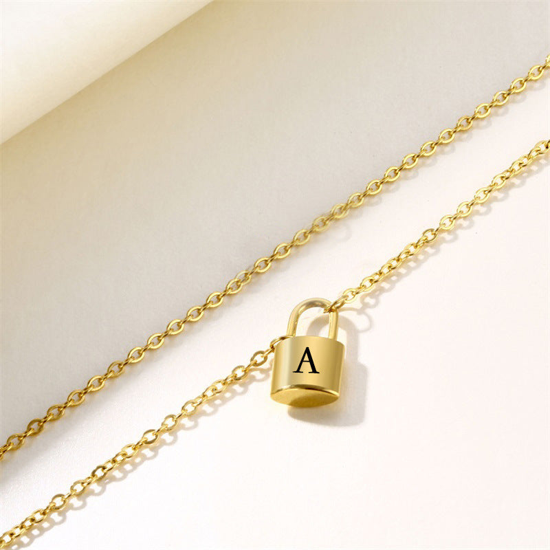 New Stainless Steel Gold 26 English Letter Lock Necklace Men And Women Concentric Lock Pendant Letter Necklace